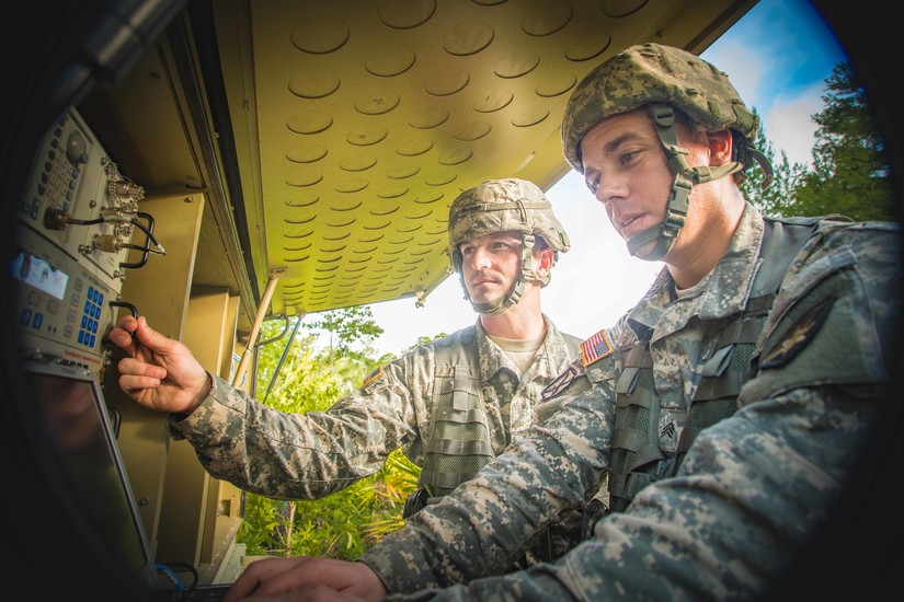 Two American Soldiers, working on STT